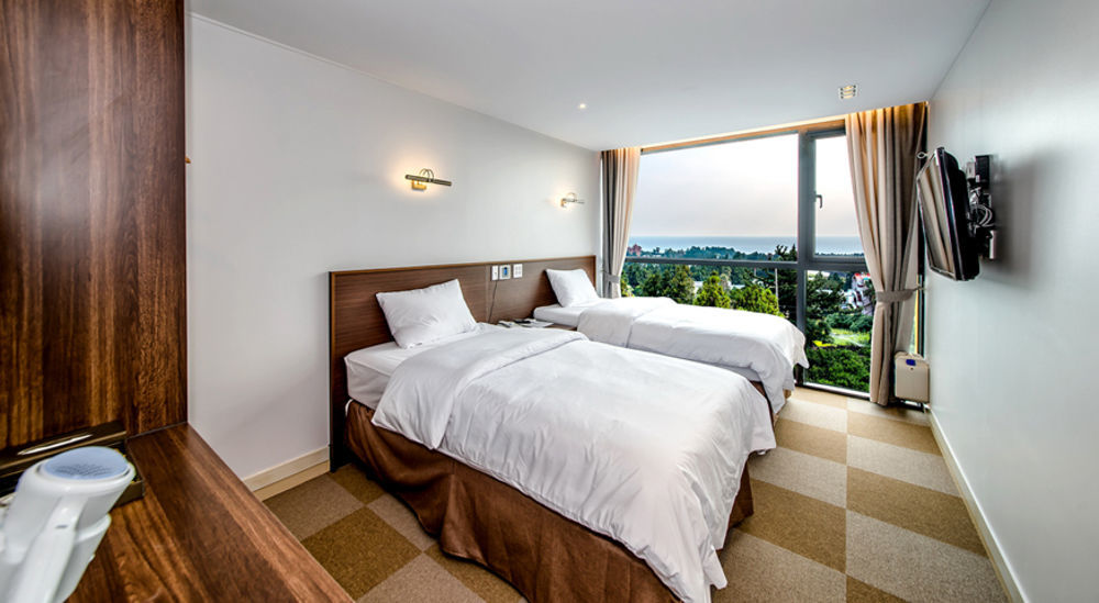 סאוגוויפו Sunrise Hotel Jungmun Branch מראה חיצוני תמונה